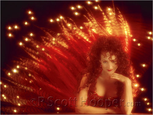 Photo of Danielle Rossetti-Busa in her red Stardust Hotel showgirl costume