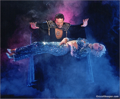Photo of Barclay Shaw levitating a showgirl