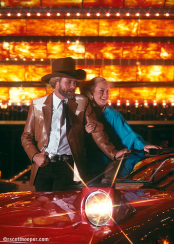 Photo of cowboy and woman in front of Dunes Hotel, Las Vegas 