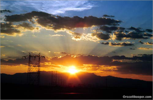 Photo of sunset with electrical towers