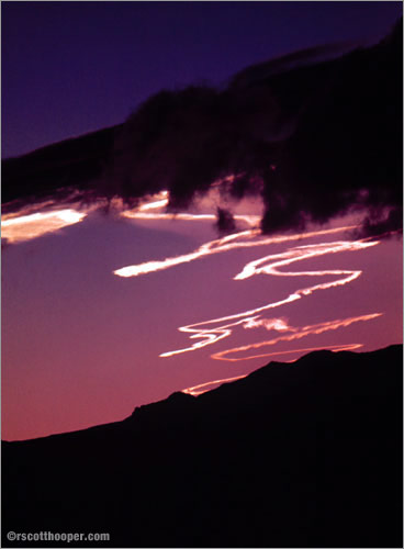 Image of vapor trails in the night sky