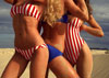 Photo of 3 girls in red, white and blue swimsuits
