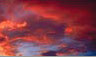 Photo of red clouds in a stormy sky