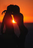 Photo of nude couple in the sunset